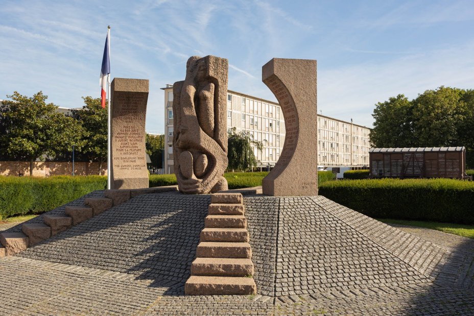 Shelomo Selinger memorial in front of the Cit de la Muette. In the background, the memorial car inaugurated in 1988.  Shoah Memorial 